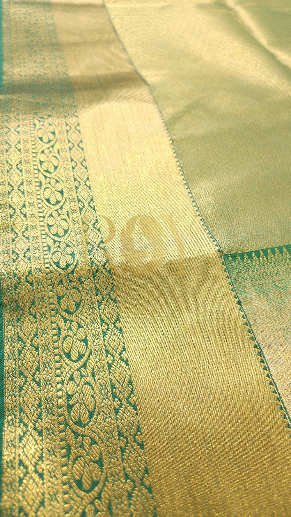 Ivory kodi brocade silk saree