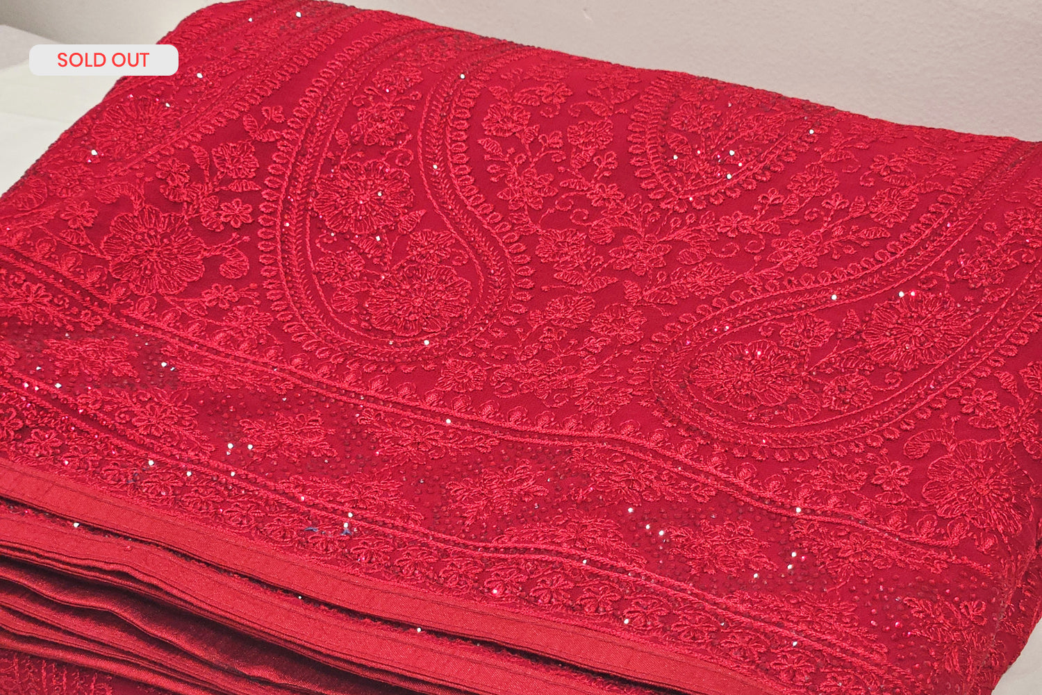 Our stunning red georgette saree