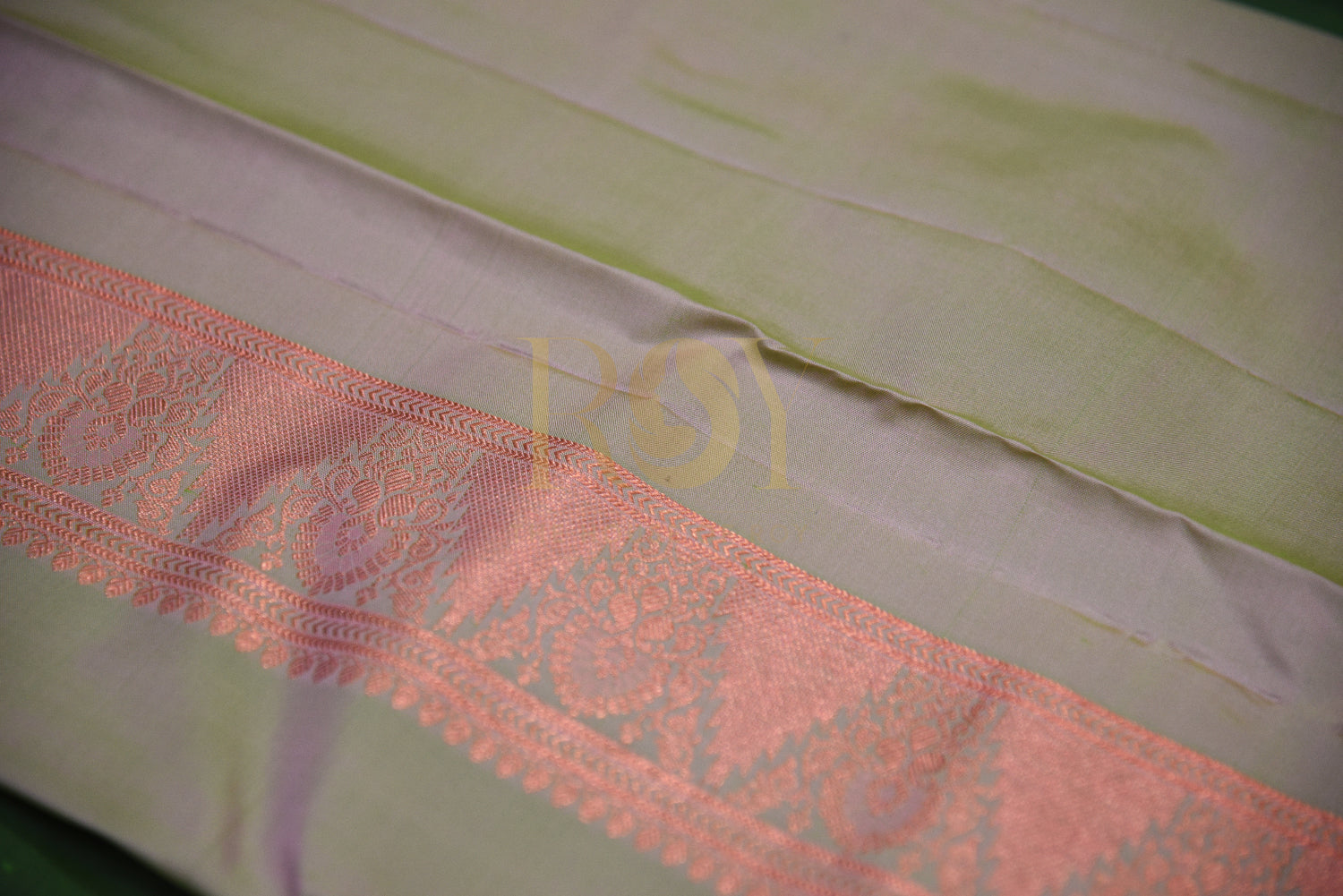 Leaf Green pure silk saree with copper jari butta