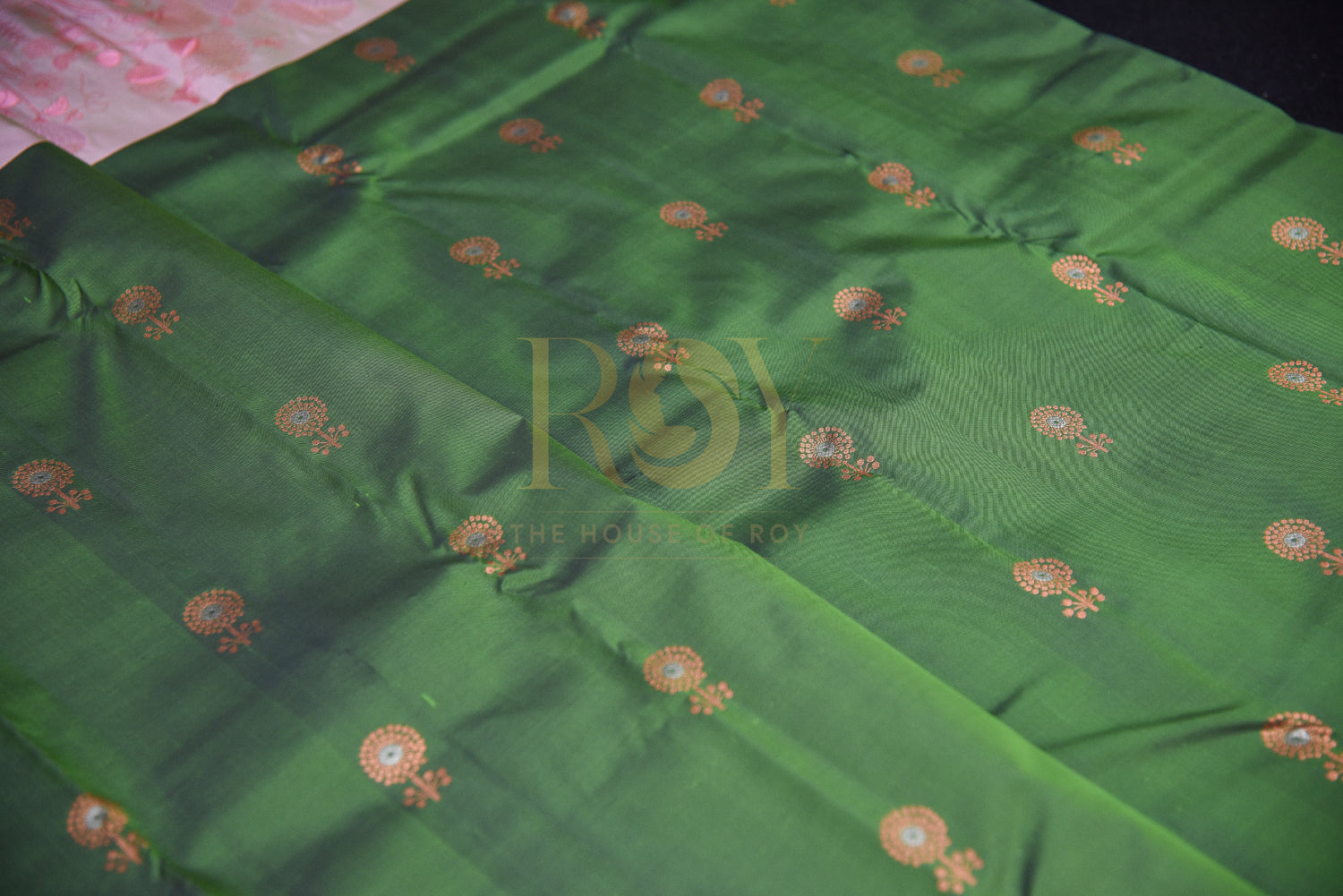 Leaf Green pure silk saree with copper jari butta