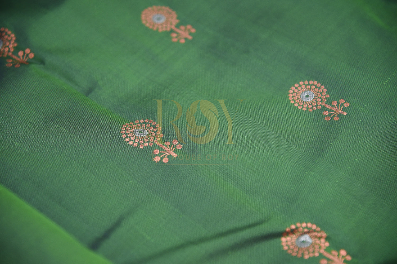 Leaf Green pure silk saree with copper jari butta