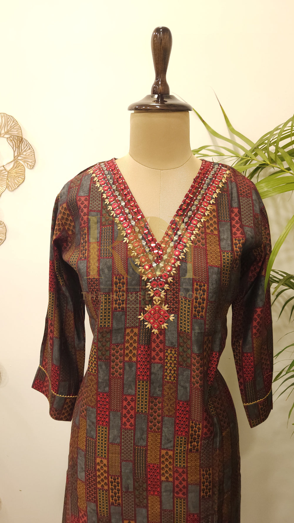 Embroidered maroon v- neck kurti