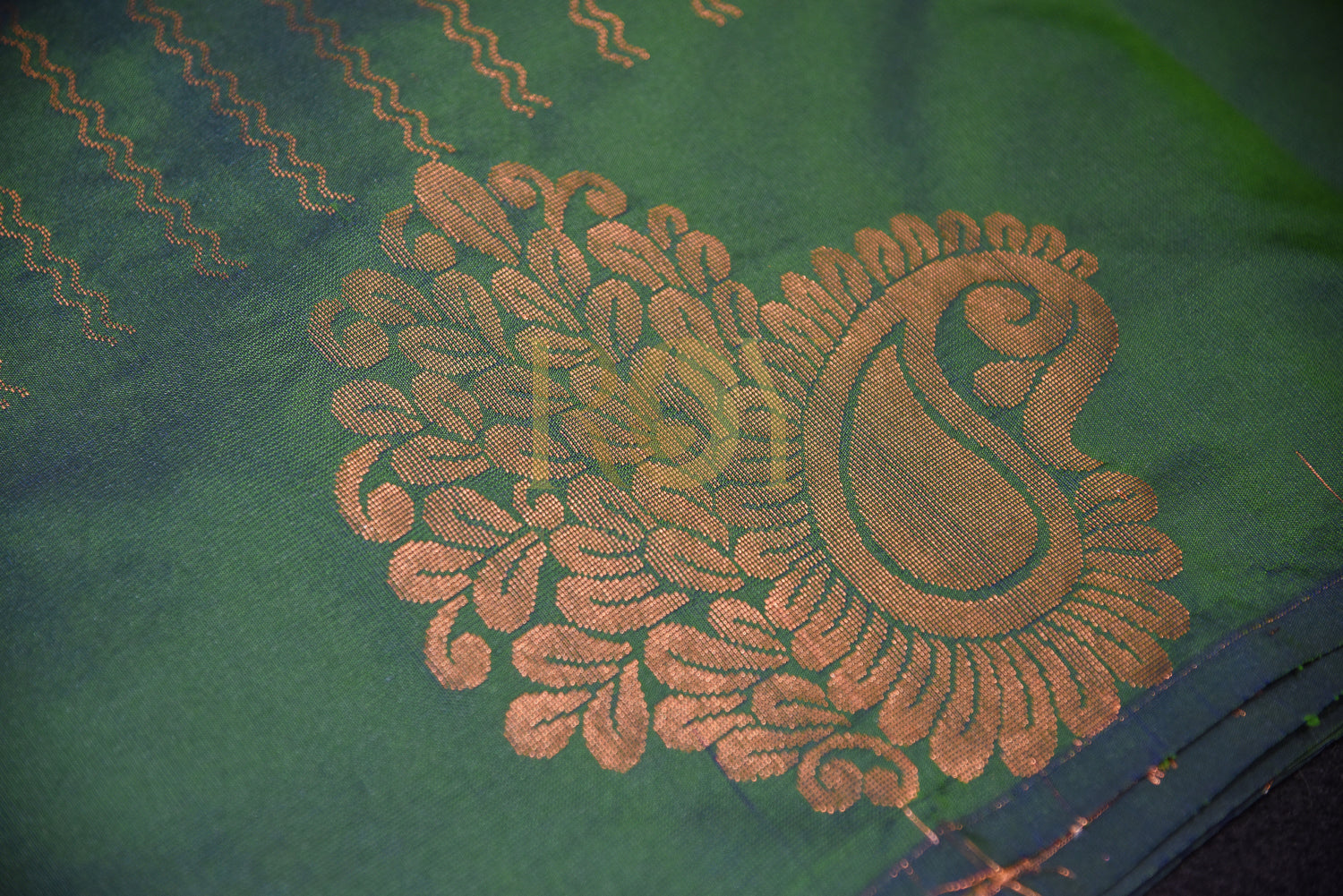 A soft silk saree woven  green