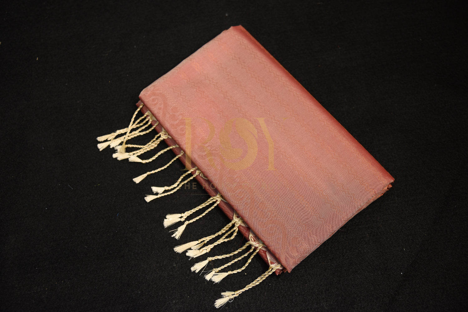 A soft silk saree woven  Dull peach