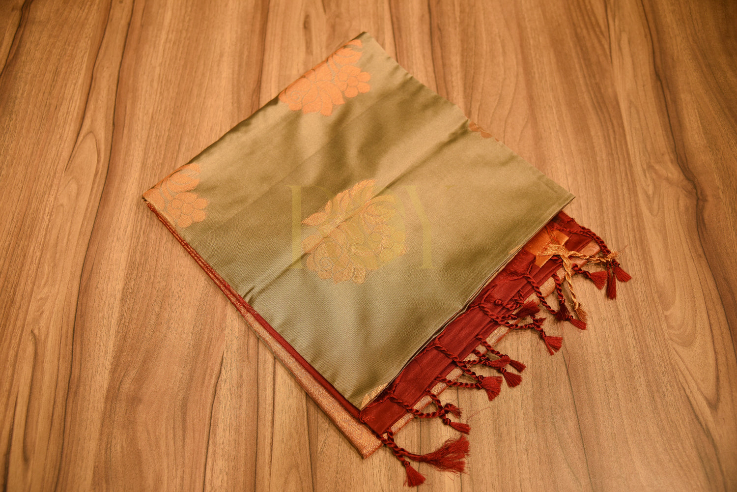 Soft silk saree with fancy floral copper jari champagne