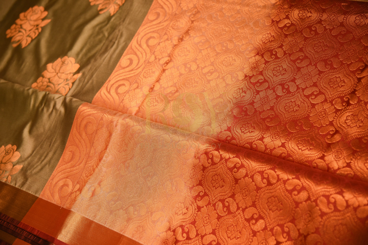 Soft silk saree with fancy floral copper jari champagne