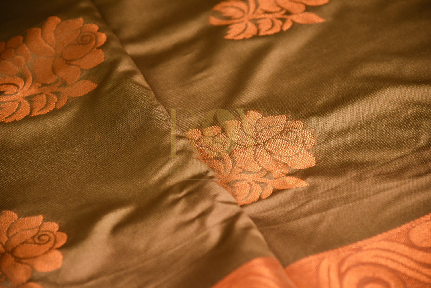 Soft silk saree with fancy floral copper jari champagne