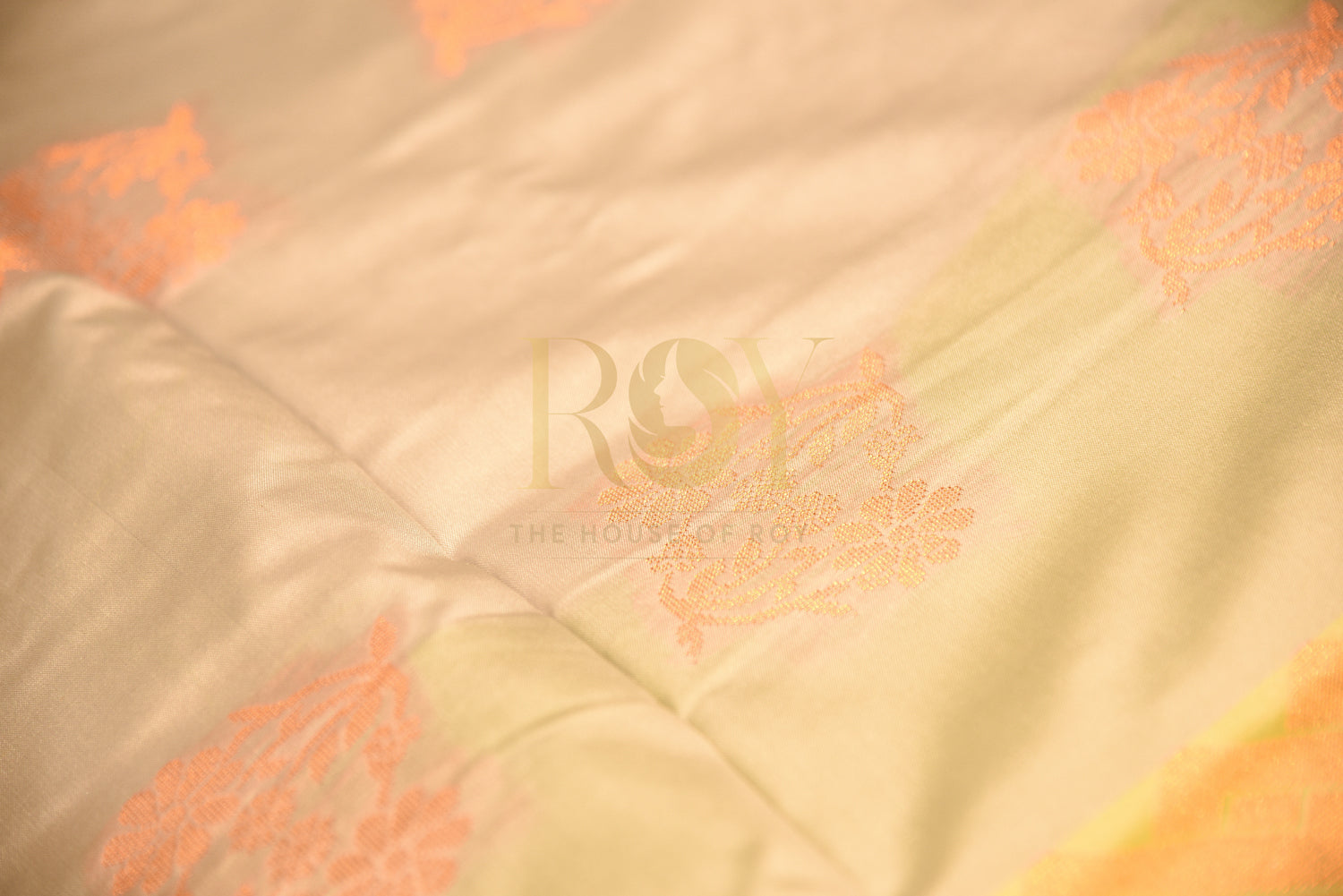 Soft silk saree with fancy floral copper jari grey