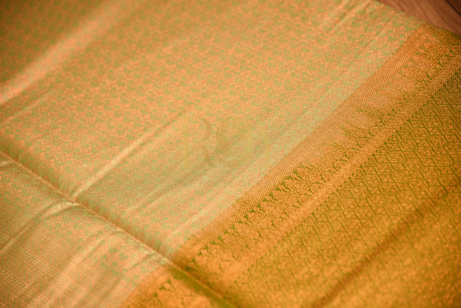 Soft silk saree with complete antique copper jari pista green