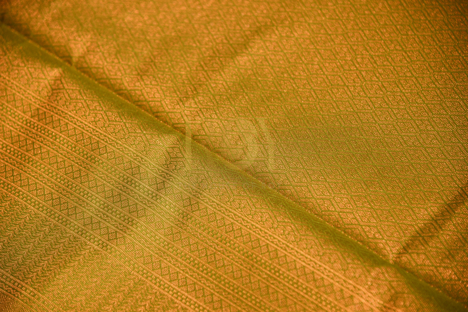 Soft silk saree with complete antique copper jari pista green