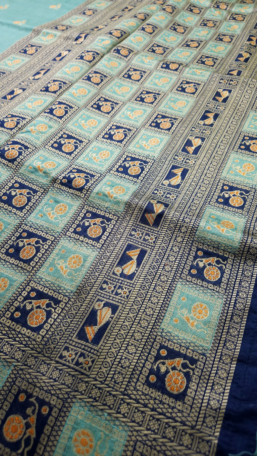 Warli Art Inspired turquoise with navy blue Cotton Saree With Exquisite Handwoven Design