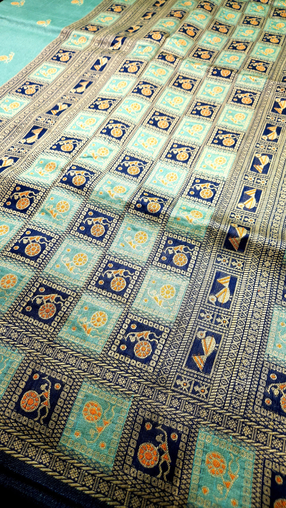 Warli Art Inspired turquoise with navy blue Cotton Saree With Exquisite Handwoven Design