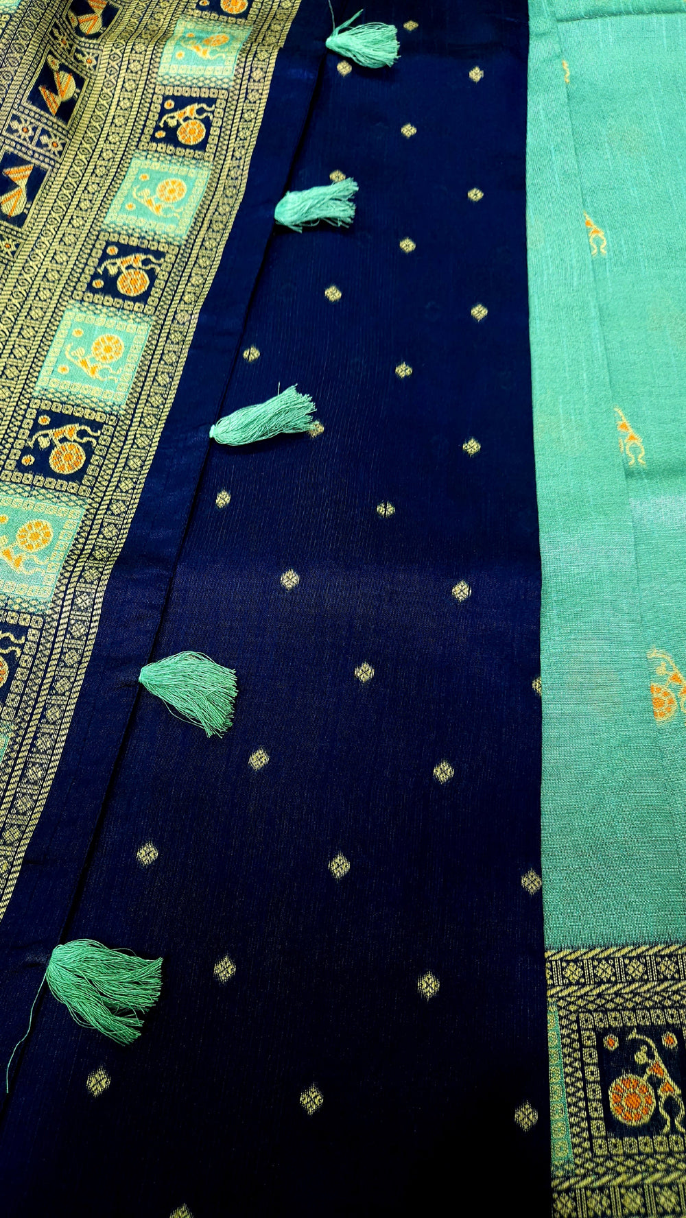 Warli Art Inspired turquoise with navy blue Cotton Saree With Exquisite Handwoven Design