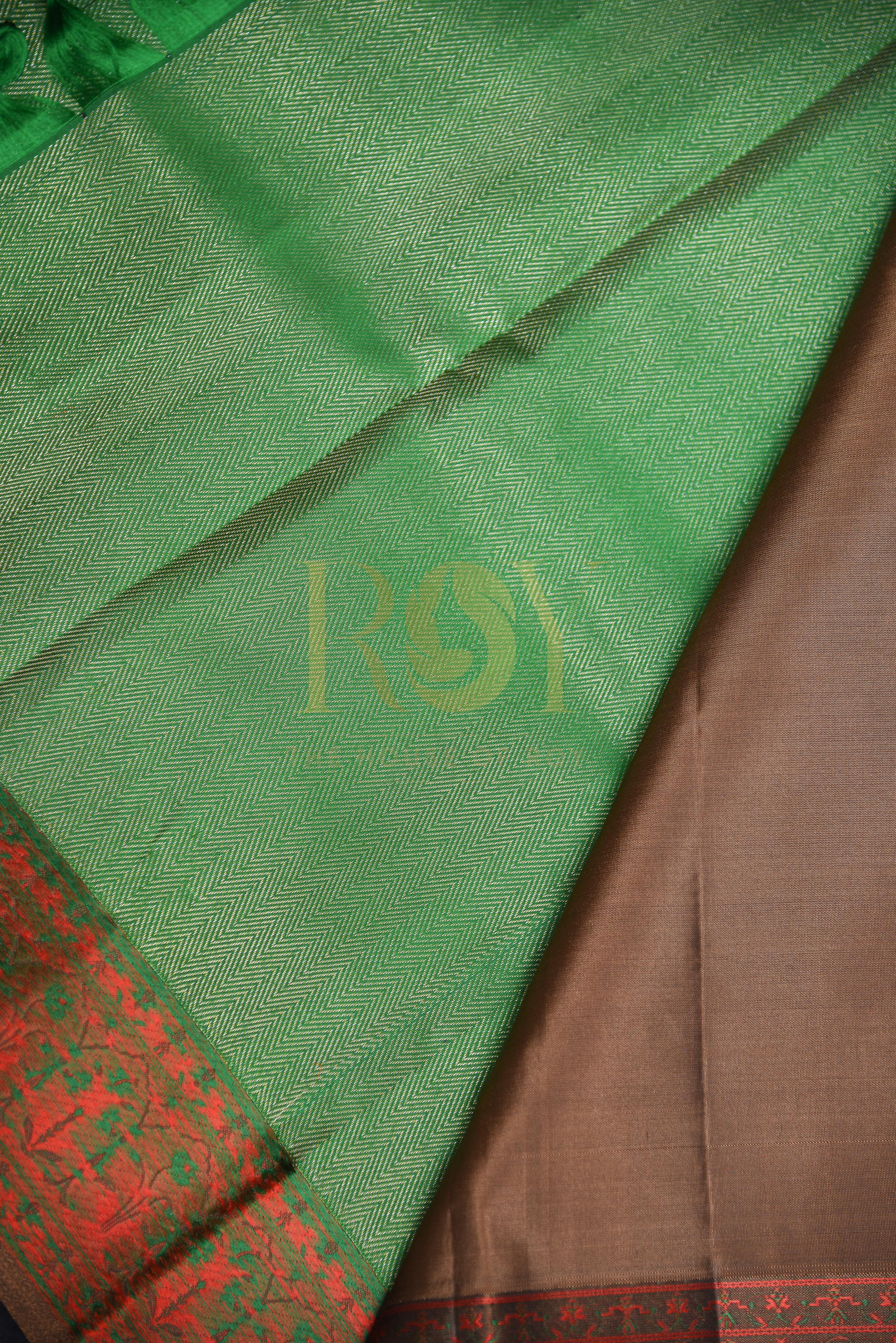 A leaf green silk saree