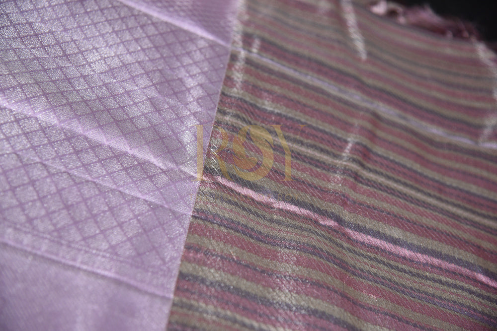 A pale lilac silk saree