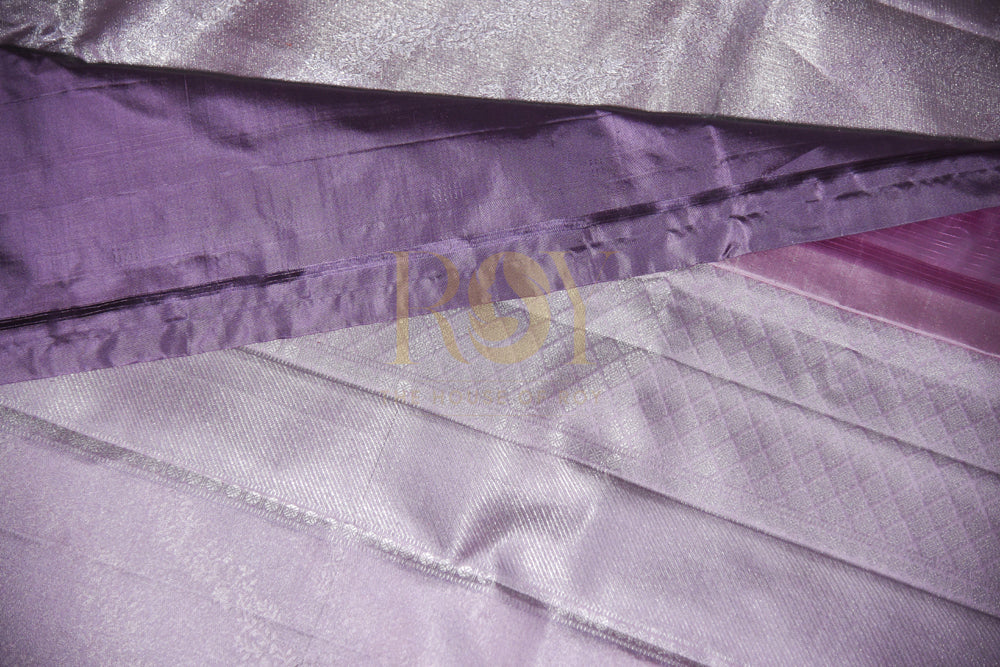 A pale lilac silk saree