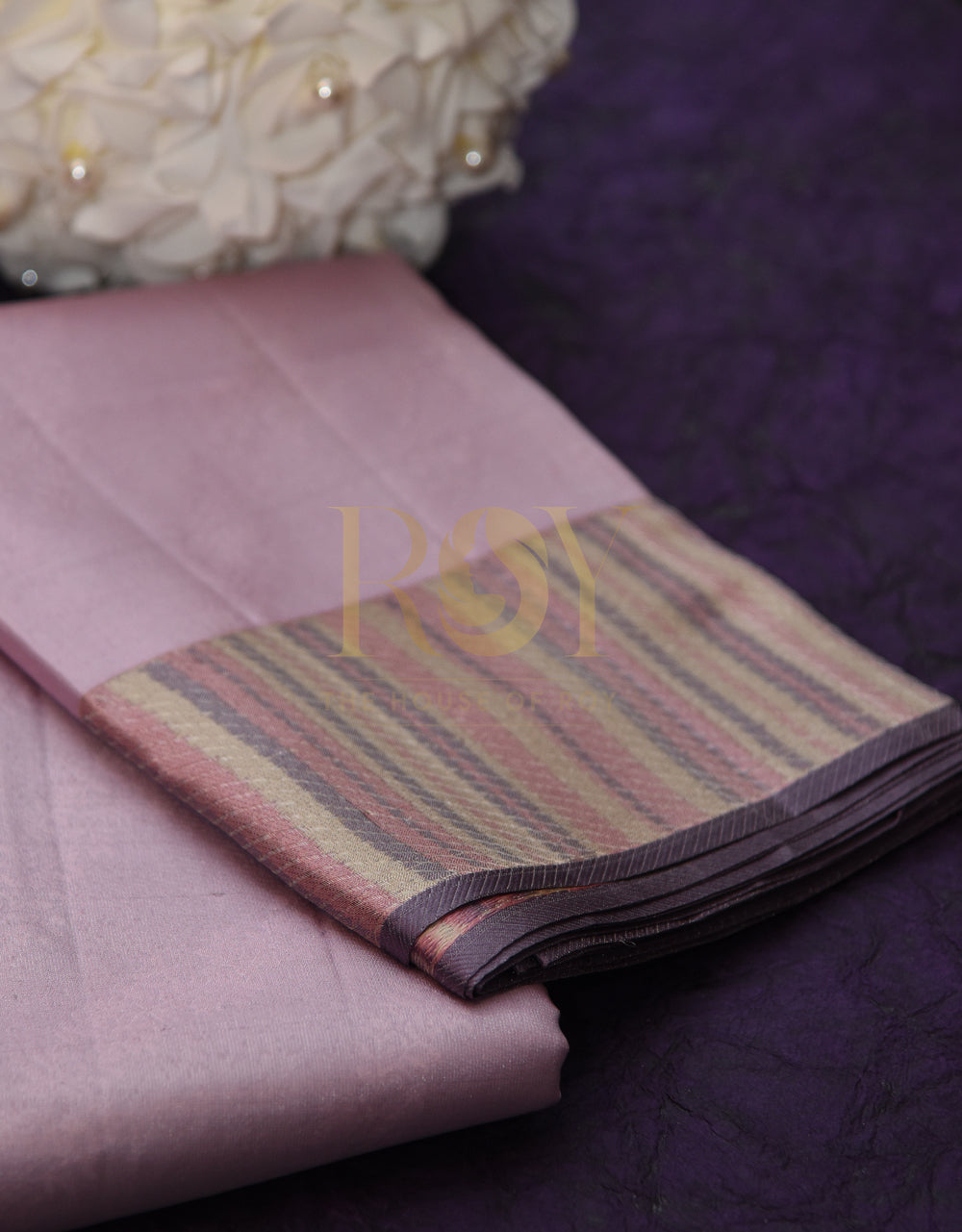 A pale lilac silk saree