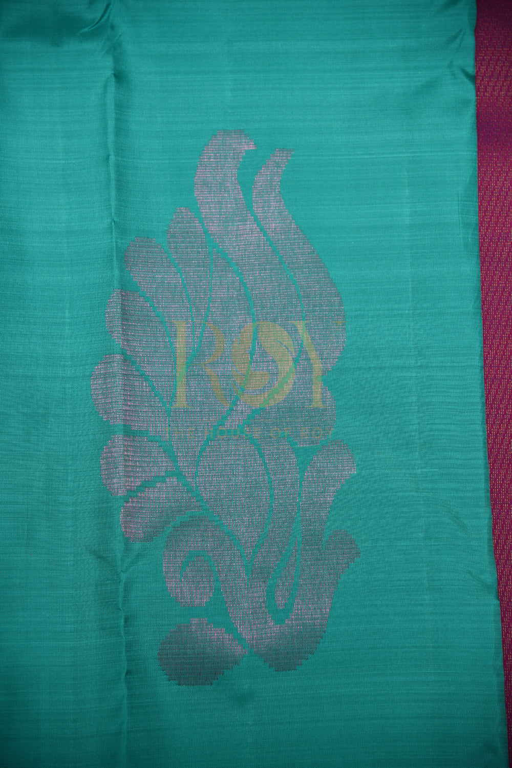 Dark Green Borderless Kanchipuram Silk Saree with Pink Zari Peacock Motif