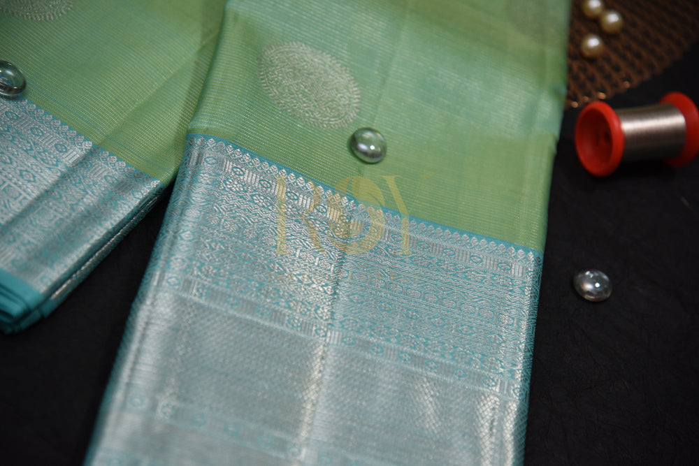 Pure Kanchipuram Silk Saree With Ice Blue & Silver Border In Pistachio Color