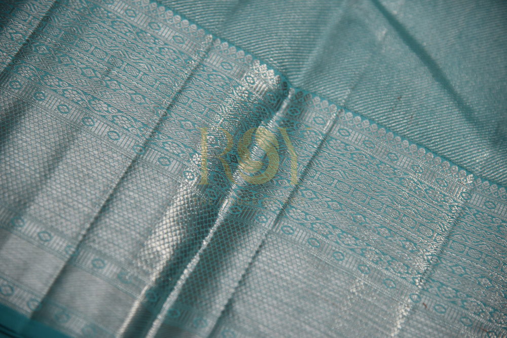 Pure Kanchipuram Silk Saree With Ice Blue & Silver Border In Pistachio Color