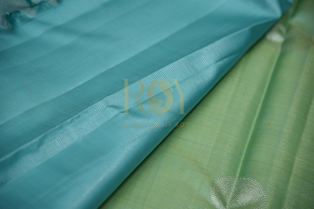 Pure Kanchipuram Silk Saree With Ice Blue & Silver Border In Pistachio Color